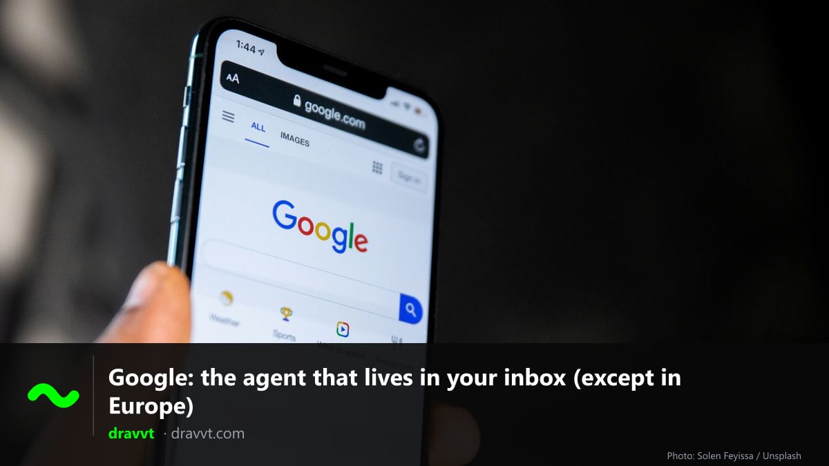 Hand holding a phone showing the Google home page, with the title “Google: the agent that lives in your inbox (except in Europe)” and the dravvt logo