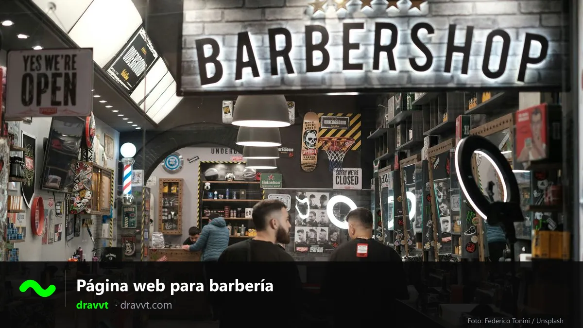 Barbería por dentro con su letrero iluminado, con el título Página web para barbería